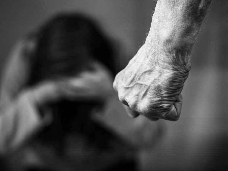 Domestic violence mans clenched fist