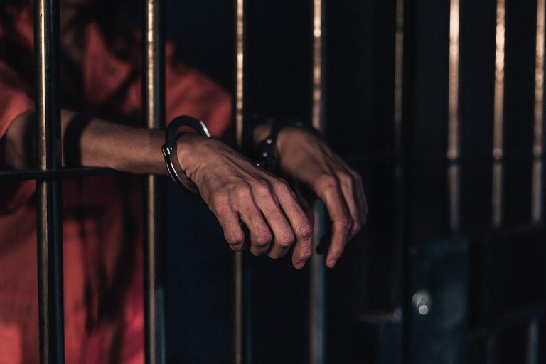 Free person with handcuffed in prison public domain people CC0 photo